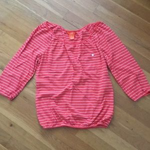 Orange boat neck top with elastic cuffs and waist